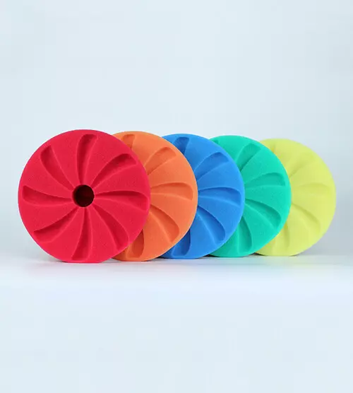 Professional polishing pad system: foam, wool, and microfiber pads matched to specific compounds and surfaces